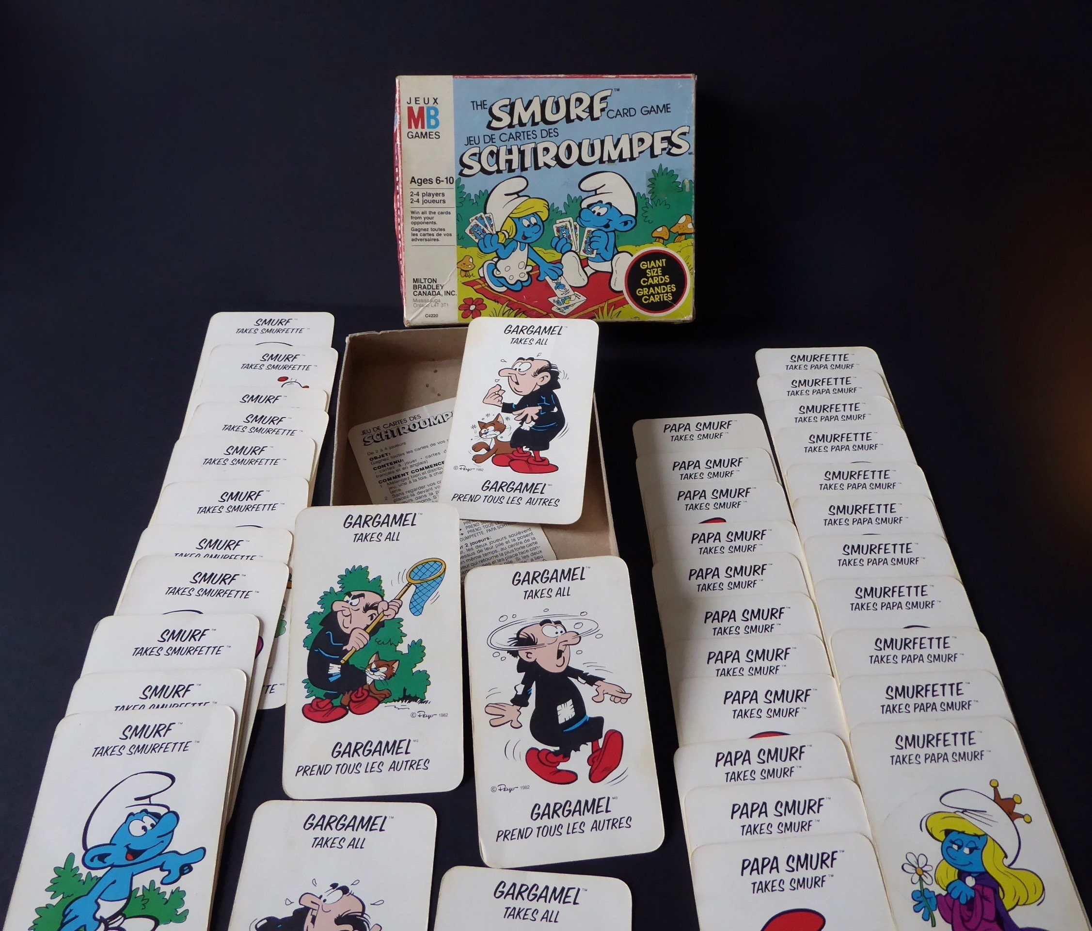 The smurf card game. The Smurf card game. Milton Bradley Canada. 1982  bilingual game. Spirou. Vintage comic. Game collection