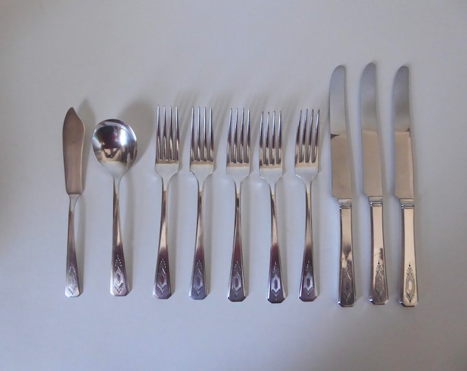 WM A Rogers A1 kitchen utensil set. Nuart 1932