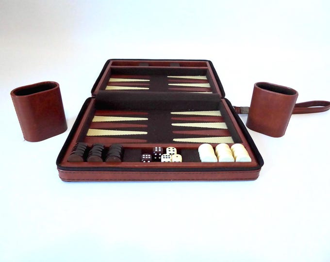 Travel backgammon game with suitcase and handle. Vintage backgammon game. 1980. Vintage board game.