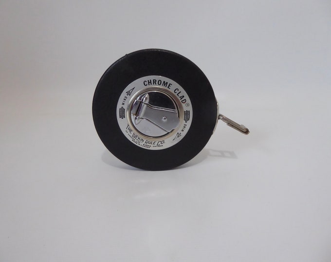 Vintage measuring tape. 33 Feet. The Lufkin Rule Co. Made in Canada. Measuring tool. 1950