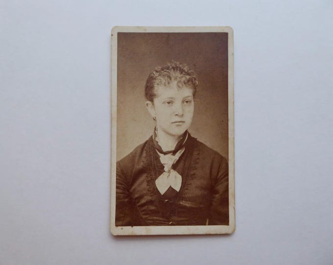 Sepia photo of a young Victorian woman. Circa 1870. Harlow photographer. St. Albans, Vermont.