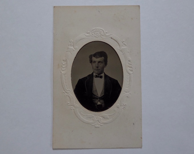 Tintype of a young man, Victorian era. 1870. Metal photo.