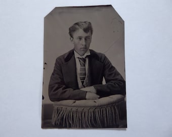 Tintype of a young man, Victorian era. 1870.