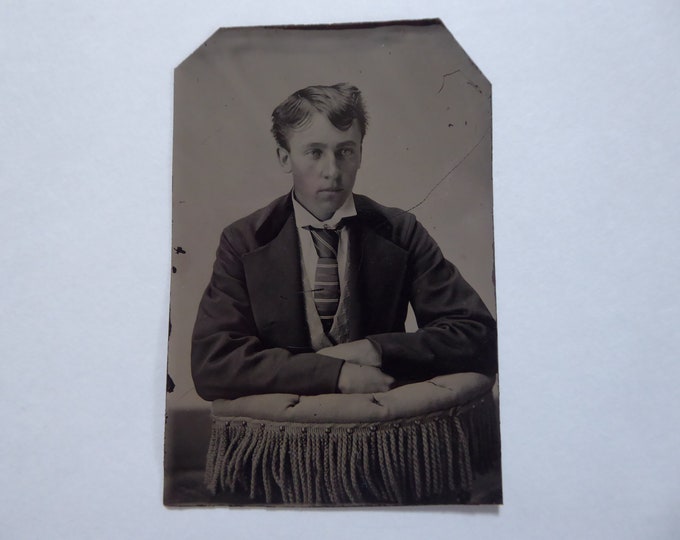 Tintype of a young man, Victorian era. 1870.