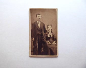 Sepia photograph of a Victorian-era couple. Circa 1870. CDV. L.B. Truax. Swanton, Vermont.
