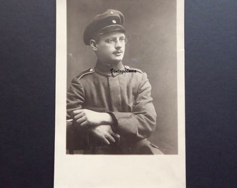 Photograph of a Russian soldier. Imperial Army. 1910. Pince-nez glasses. Lorgnette. Binocle. Woolen cloth cap. Militaria.