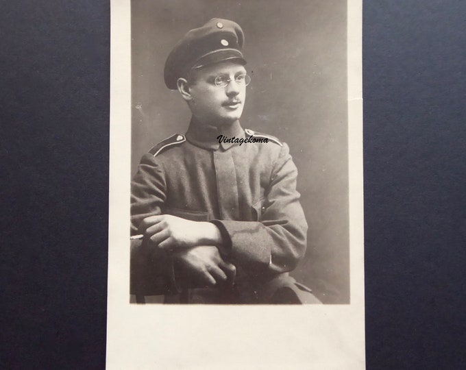 Photograph of a Russian soldier. Imperial Army. 1910. Pince-nez glasses. Lorgnette. Binocle. Woolen cloth cap. Militaria.