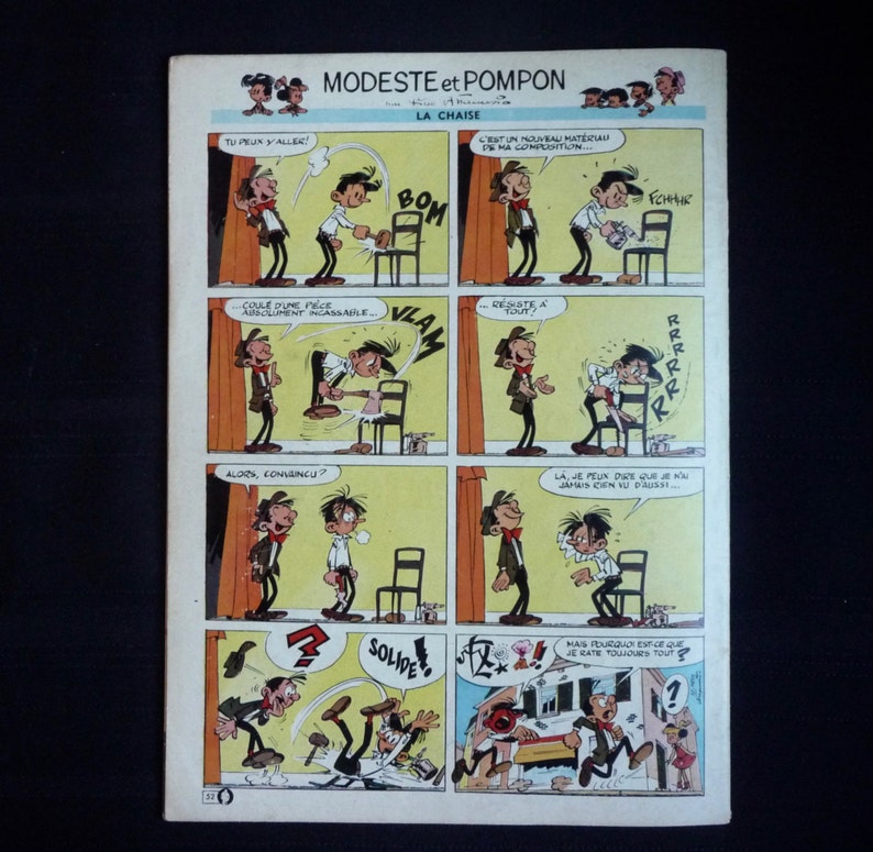 May include: A comic book page featuring a cartoon character named Modeste and Pompon. The comic strip is titled "Modeste et Pompon: La Chaise" and shows the two characters testing the strength of a chair. The text in the comic strip includes "Tu peux y aller!" (You can go!), "C'est un nouveau mat&eacute;riau de ma composition..." (It's a new material of my composition...), "Alors, convaincu?" (So, convinced?), "La, je peux dire que je n'ai jamais rien vu de plus solide!" (There, I can say that I've never seen anything more solid!), and "Mais pourquoi est-ce que je rate toujours tout?" (But why do I always miss everything?).