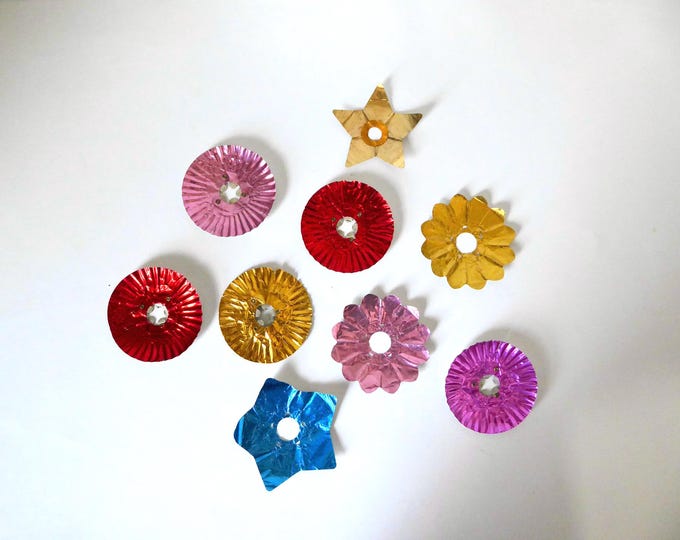 Set of 9 shiny aluminum Christmas tree light reflectors. 1950s. Vintage Christmas decoration. Retro Christmas tree.