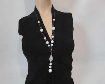 White glass bead necklace with translucent pendant. Princess length necklace. 1980.