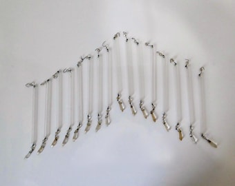 Glass chandelier pendants. Glass tube for lamp decoration. Circa 1920.