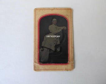 Framed tintype of a young woman from the Victorian era. 1870.