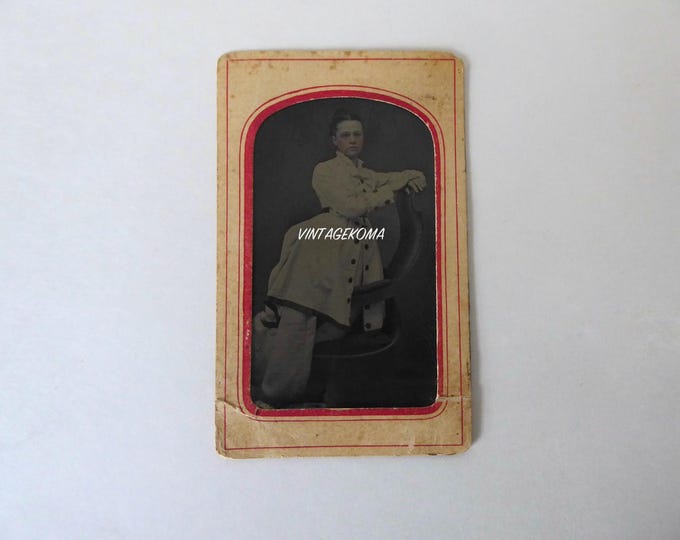 Framed tintype of a young woman from the Victorian era. 1870.