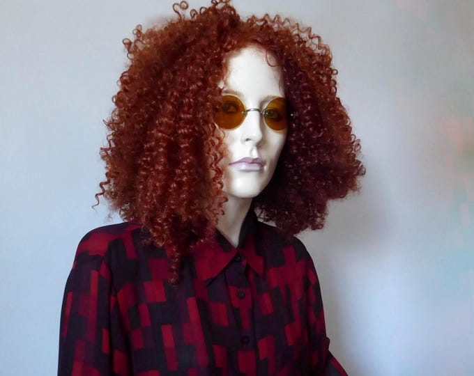 Lunette victorienne Taw & Co. forme ronde de couleur jaune. Vers 1890.