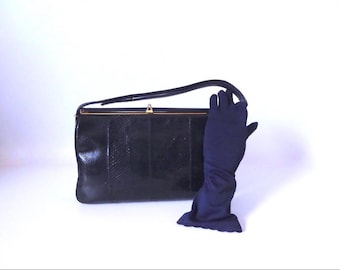 Shoulder bag, handbag, in navy blue snakeskin leather. Browns. 1950s/60s.