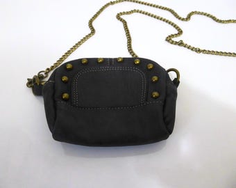 Mini studded leather shoulder bag. Besha. Argentina. 1980s.