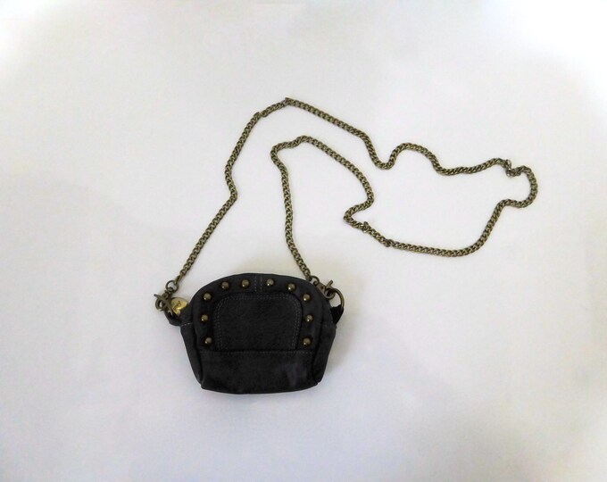 Mini studded leather shoulder bag. Besha. Argentina. Year 1980.