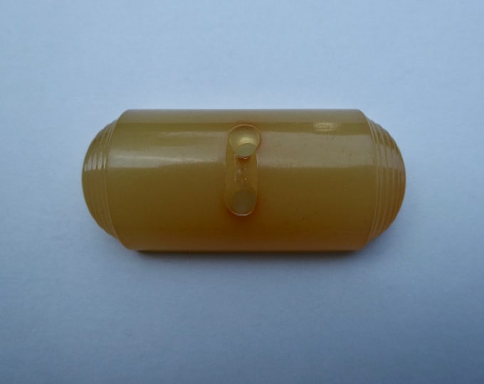 Huge vintage resin honey colored button. Streamline. 1930s