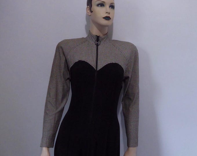 Stretch jumpsuit with houndstooth pattern shoulder pads. 1980. New wave garment.