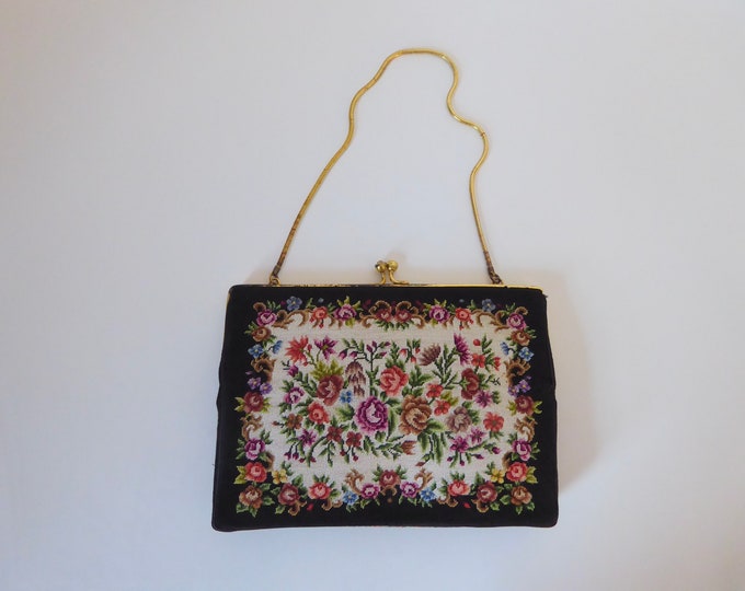 Black handbag embroidered fabric tapestry. Floral and rose pattern. 1930. Vintage evening bag.