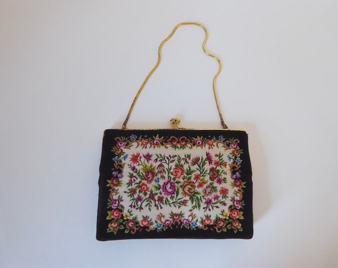 Black handbag embroidered tapestry fabric. Floral and rose pattern. 1930. Vintage evening bag.