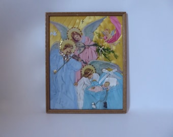 Antique collage frame in 3 dimensions. Birth celebration with 4 angels, baby, cradle. Religious frame. Religious art. 1930-1940.