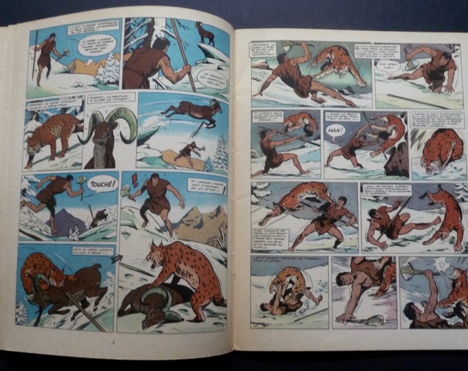 Tintin Journal. EO 1968. Tounga and the god of fire. Aidans. Prehistory. Volcano. Black panther. Caveman. Nature.