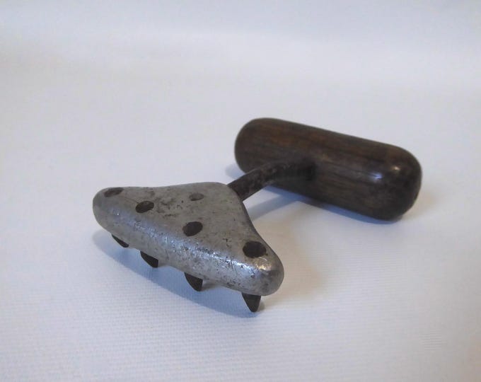 Antique hand tool. Docker's hook. Farm hook. Circa 1910.