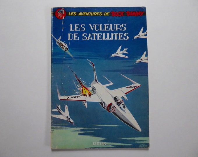 Danny Buck. EO 1964. Satellite thieves. Charlier-Hubinon. Spirou newspaper. U.S. Air Force. Aeronavale. Submarine. Missile crisis.