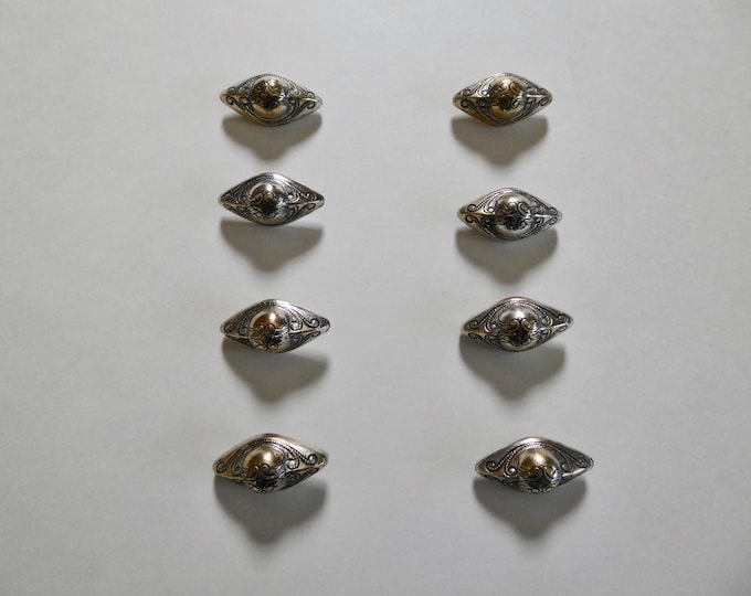 Lot of 8 antique oblong shank buttons in silver-plated copper.