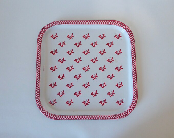 Metal serving tray with checkerboard pattern and red cherry. Made in England. 1950