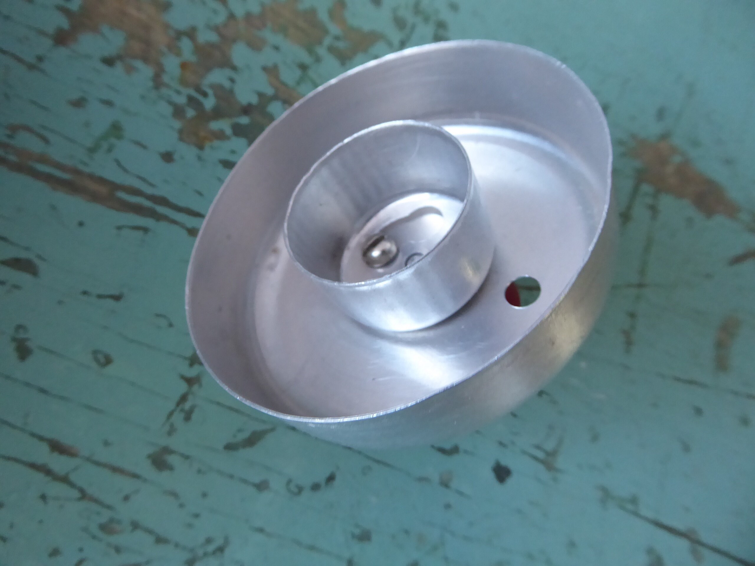 Aluminium vintage doughnut cookiecutter, red wood handle. Year 40/50