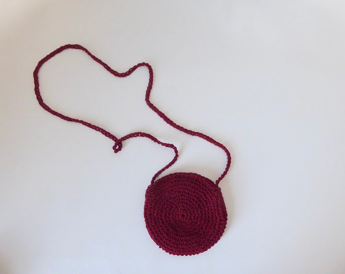 Small round burgundy crocheted shoulder bag. Made in Italy. 1980. Vintage peace and love accessory.