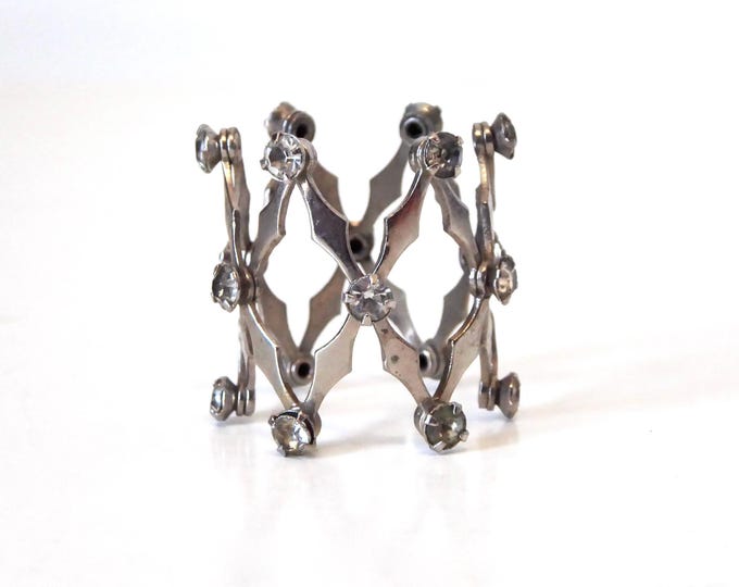 Adjustable decorative hair accessory. Silver metal. Hair clip for bun. 1960.