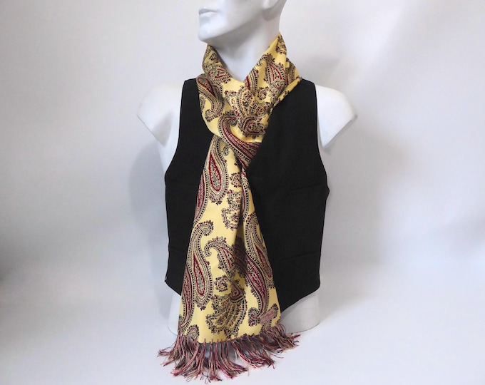 Ivory, gold, burgundy, and black paisley scarf. Scarf Brill by Hand Fringed. 1960.