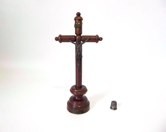 Crucifix on a wooden stand, Sir of Our Lady of the Cape. 1900. Vintage religious object.