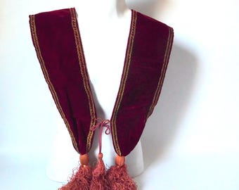 Red silk velvet liturgical stole with gold embroidered trim. Vintage liturgical vestment. Circa 1900.