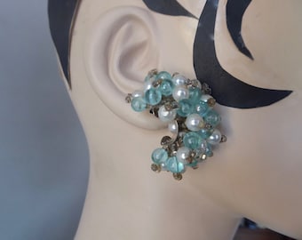 Vintage half circle earring with aqua colored plastic ball and pearl. Pierced ear. 60s. Space age. Fashionista. Mods.
