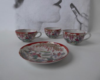 Set of 1 Kutani teacup and 3 saucers. Japan. 1920. Burnt orange eggshell porcelain. Hand painted. Children's game motif.