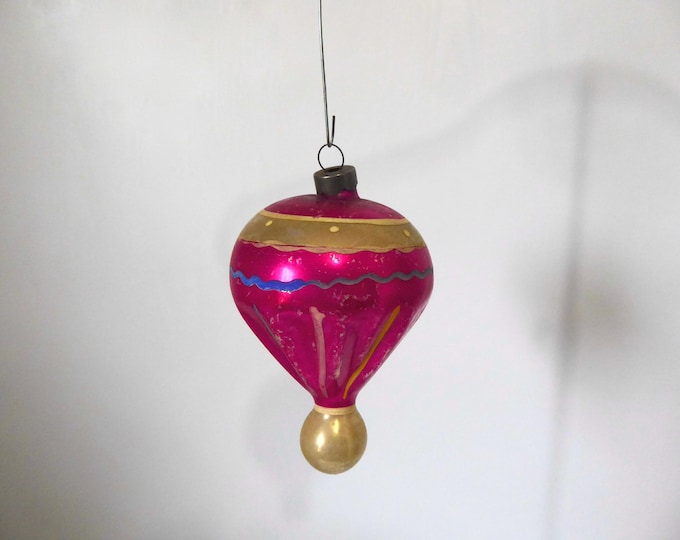 Vintage pink and gold blown glass Christmas ball. 1950s. Christmas decoration. Vintage Christmas tree.