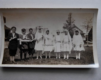 Vintage photo of first communion. Province of Quebec. Year 30.