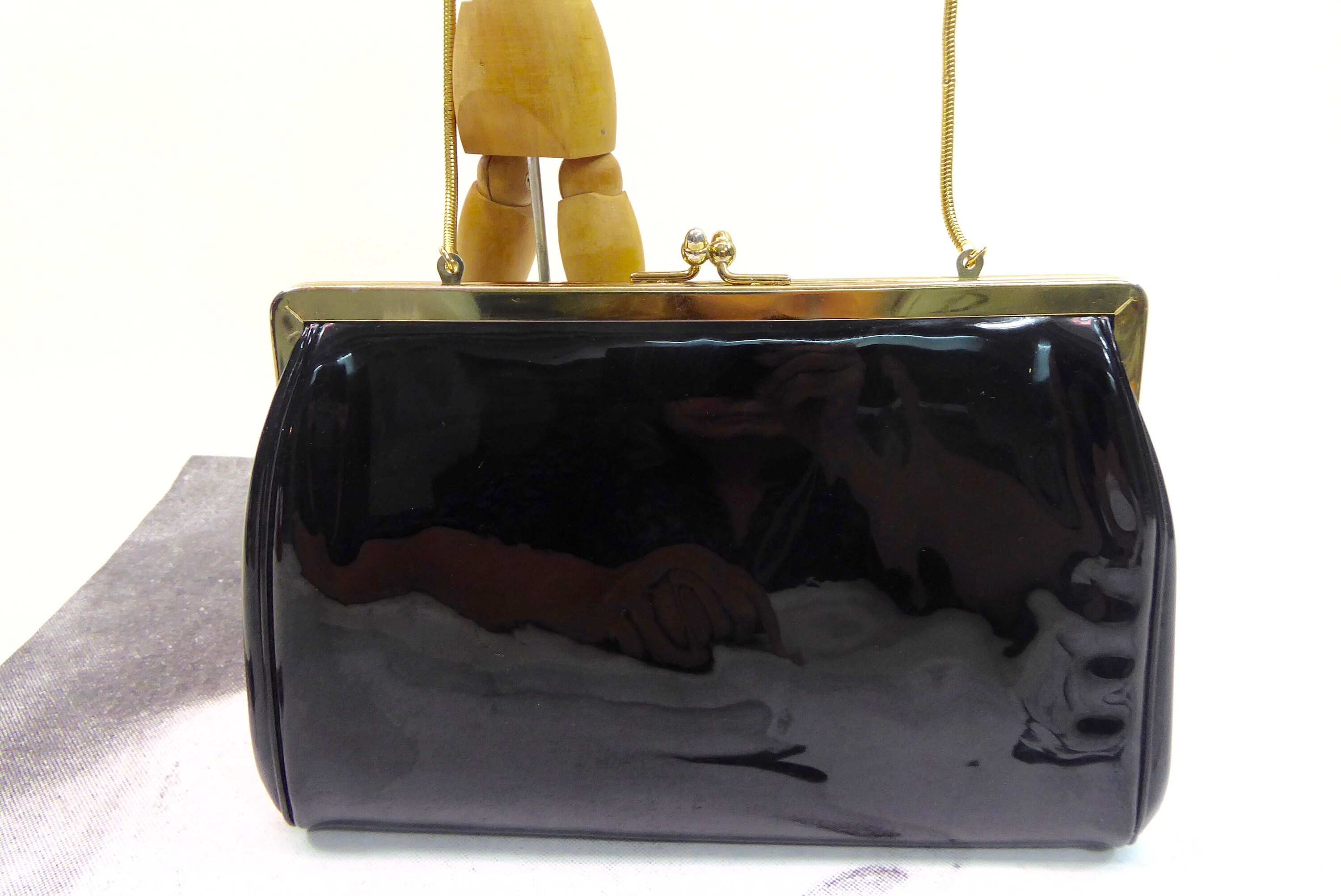 Ingber Black patent leather clutch bag. year end 1950.debut year 60
