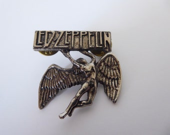 Vintage Led Zeppelin pin. Brushed metal. 1980. Icarus Led Zeppelin symbol.