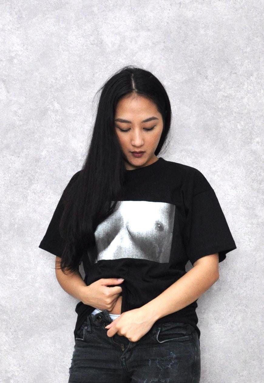 Supreme shirt with top girl on it