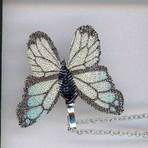 Fashion Handmade, Gray/blue in color, Butterfly Necklace, with 18&quot; silver chain and veins