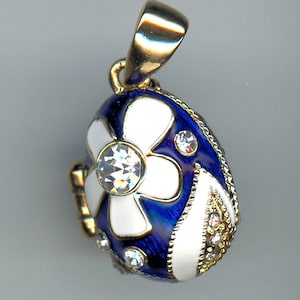 Russian Faberge Silver egg Pendant, Blue w/ White Petal design w/ gemstones, on both front and back, opens up Heart inside .925 Sterling