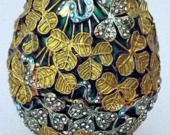 Russian Replica Golden/w/Green background, Enameled  Faberge Leaf Pattern with many gemstones embedded.