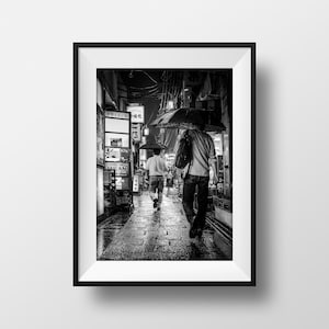 Black & white photo print - Tokyo street in the rain, neon atmosphere and umbrellas