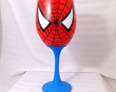 Superhero inspired hand painted wine glass.