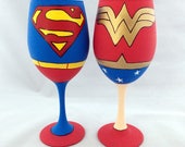 Superhero inspired hand painted wine glass.